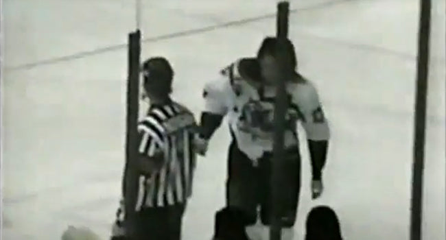 a-central-texas-stampede-hockey-player-skating-to-the-penalty-box